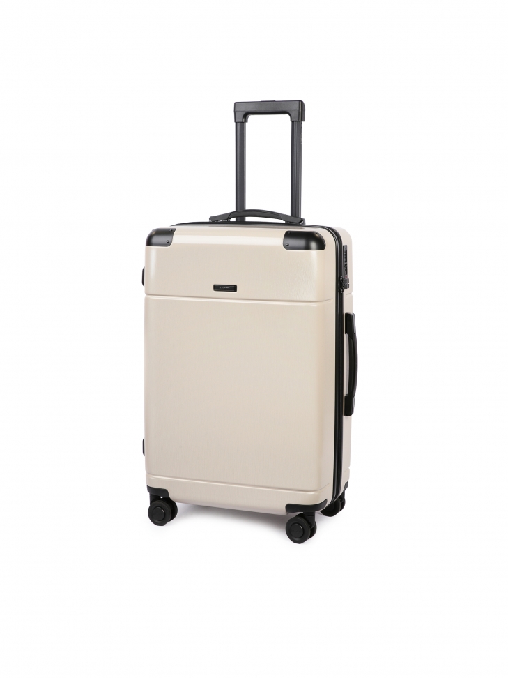 Medium sized suitcase made of beige polycarbonate