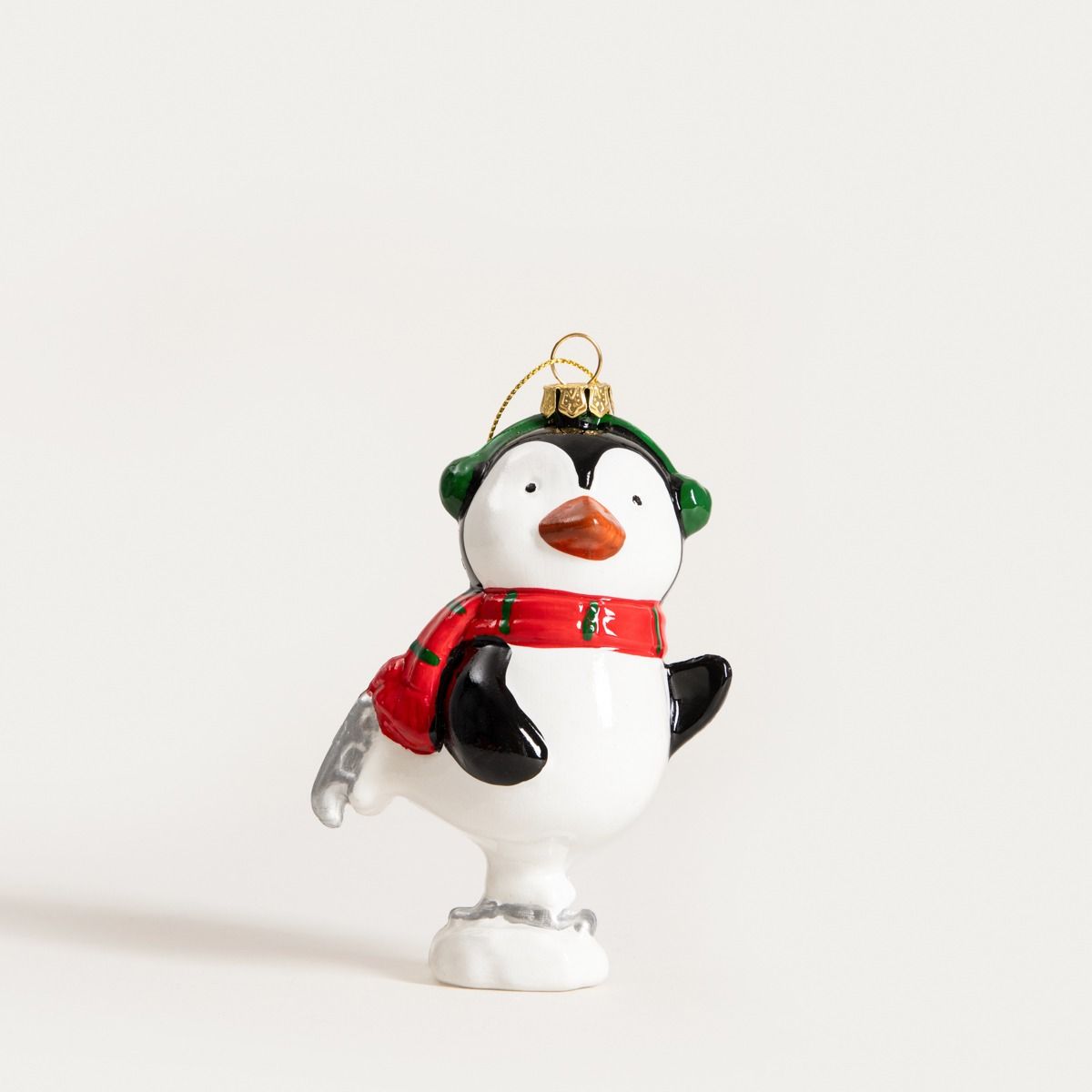 Zawieszka EVI RED pingwin na łyżwach z nausznikami 11,4 cm