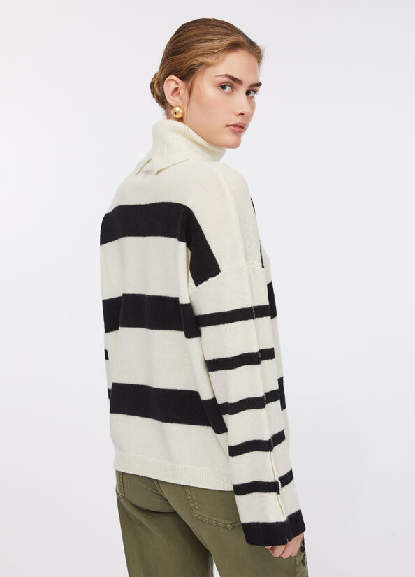 Dolcevita 100% lana con bottoni gioiello