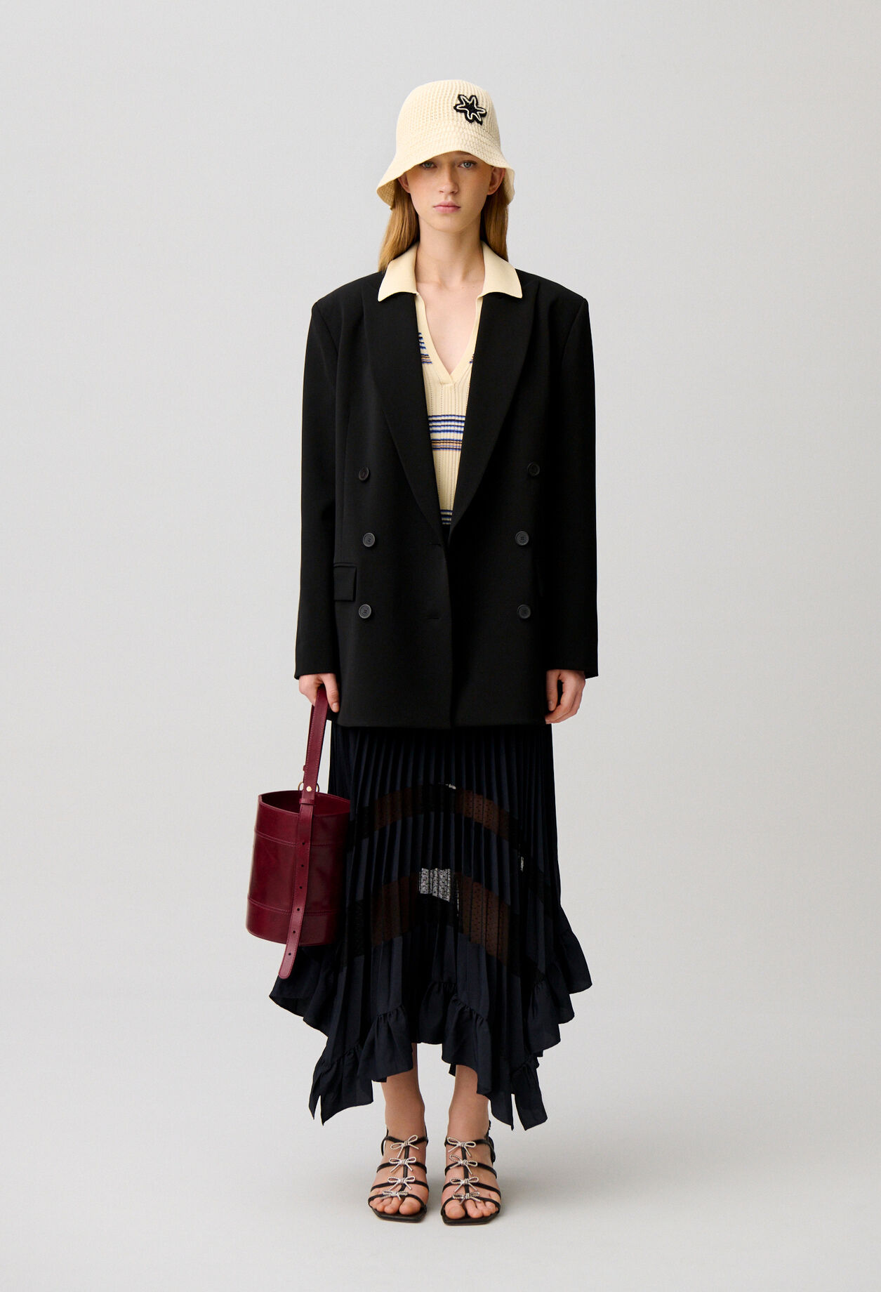 Jupe midi plissée et asymétrique