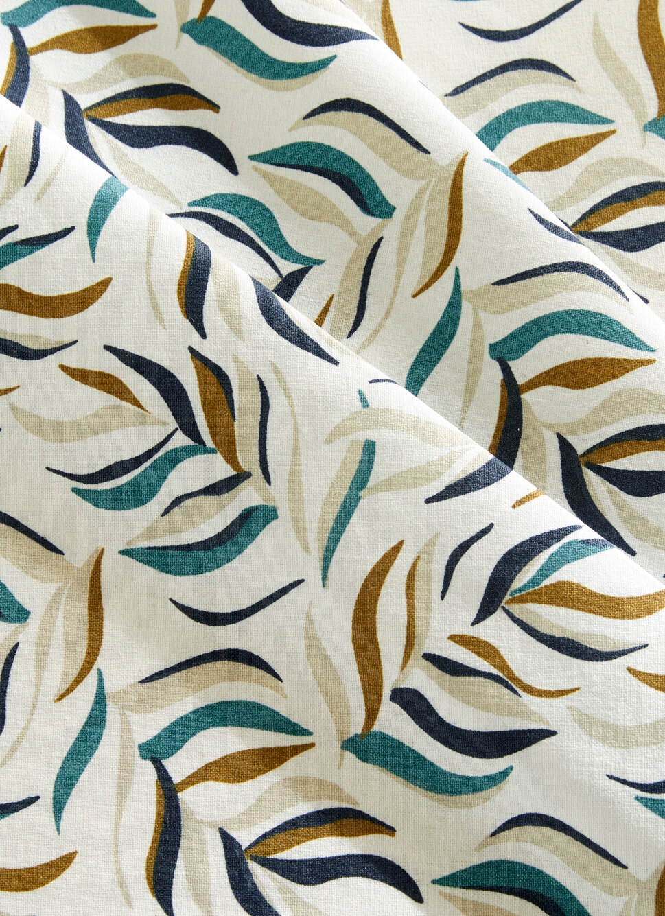 NAPPE RONDE ENDUITE IMPRIMÉ FEUILLES CLOÉ MULTICOLORE