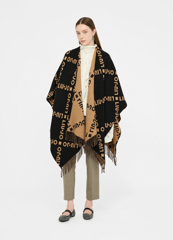 Poncho con logo e frange