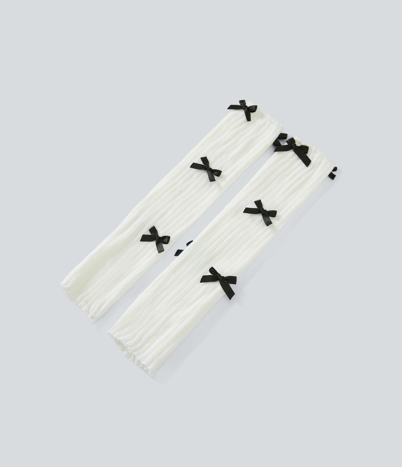 Jambières en maille avec nœud