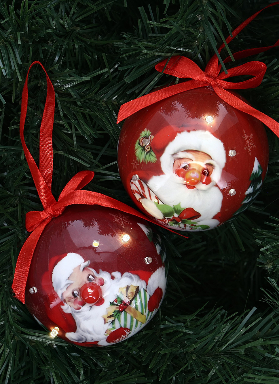 BOULE LUMINEUSE PÈRE-NO&Euml;L (MODÈLE ALÉATOIRE) RUBIS