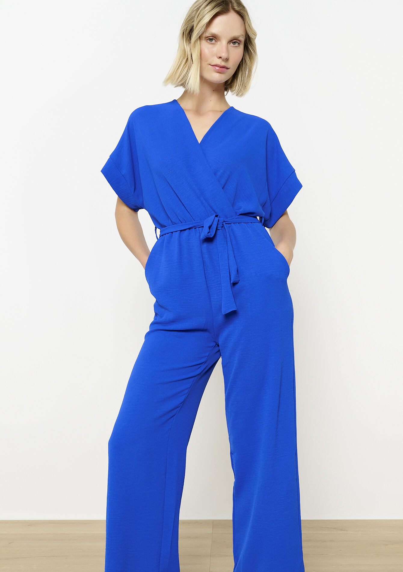 Vloeiende jumpsuit met ceintuur