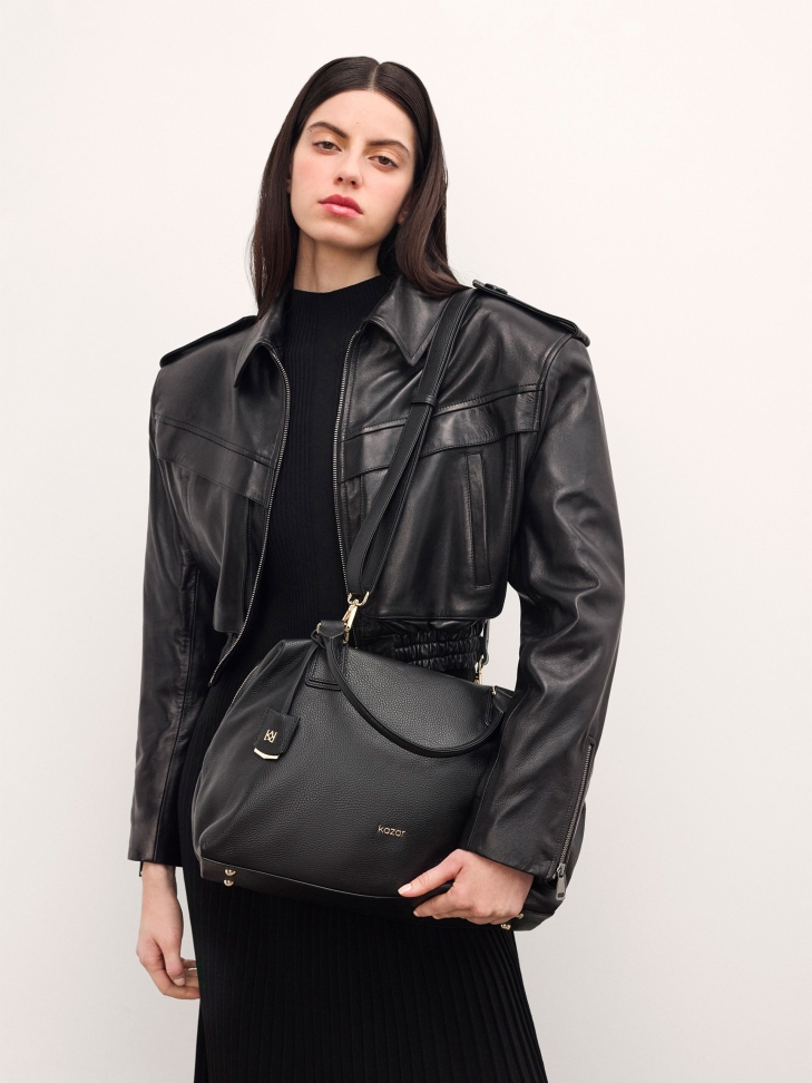 Black leather handbag with key ring and detachable strap