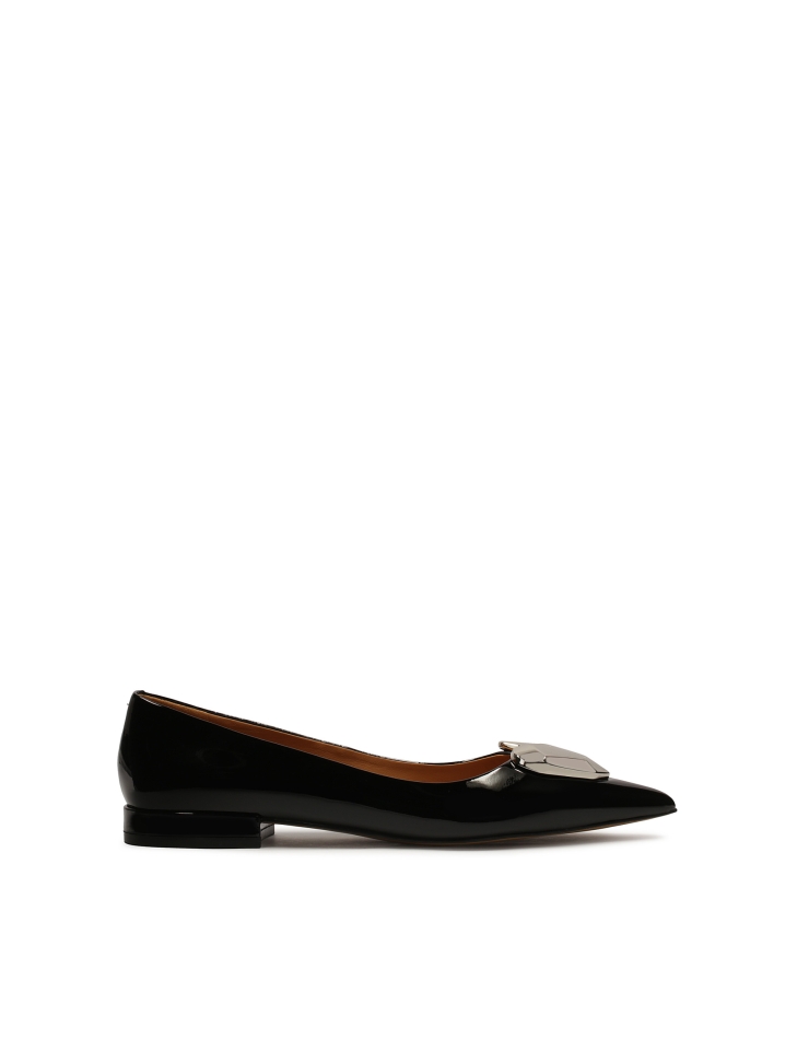 Black patent leather pumps on a flat sole
