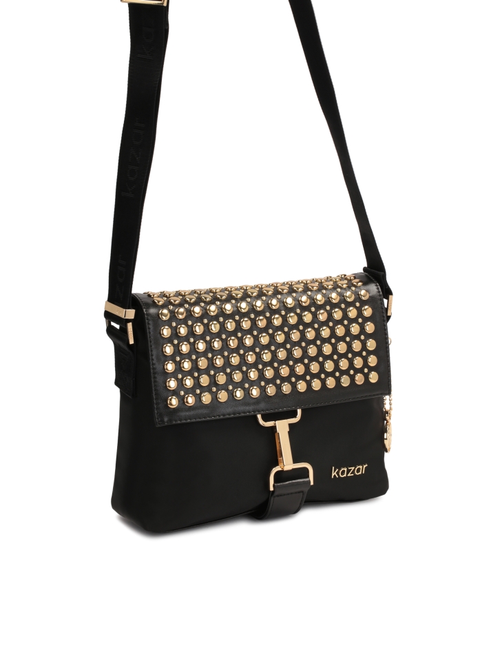 Black bag with metal rivets on the flap