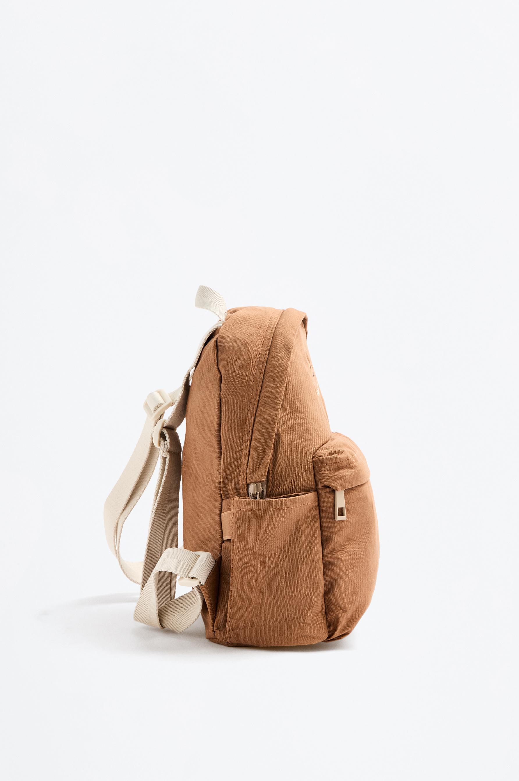 Mochila escolar detalle oso