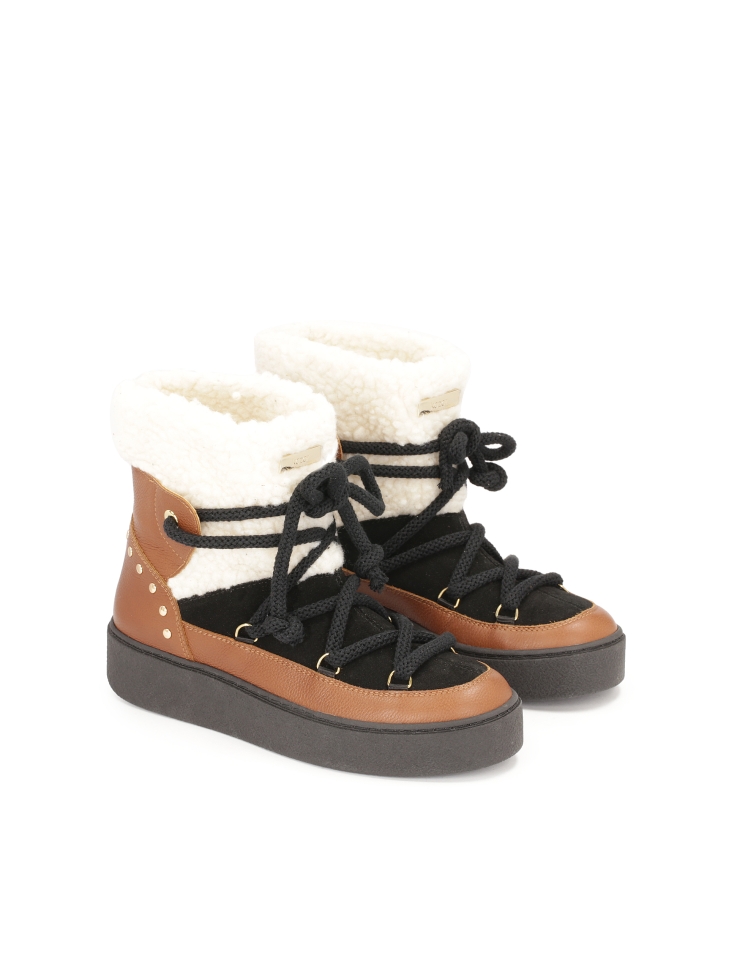 Colorful snow boots made of combined materials