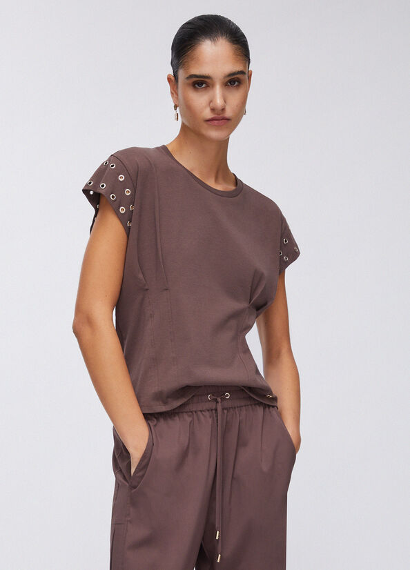 T-shirt con occhielli decorativi