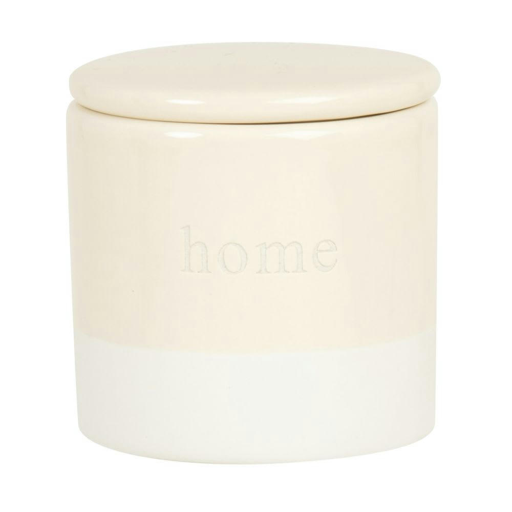 - Bougie parfumée en céramique blanche et beige