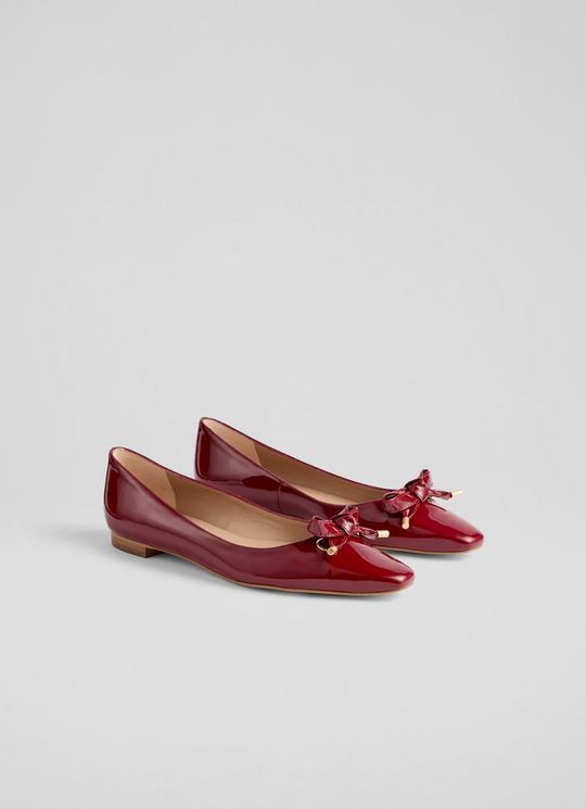 Mabel Red Patent Eyelet Bow Flat