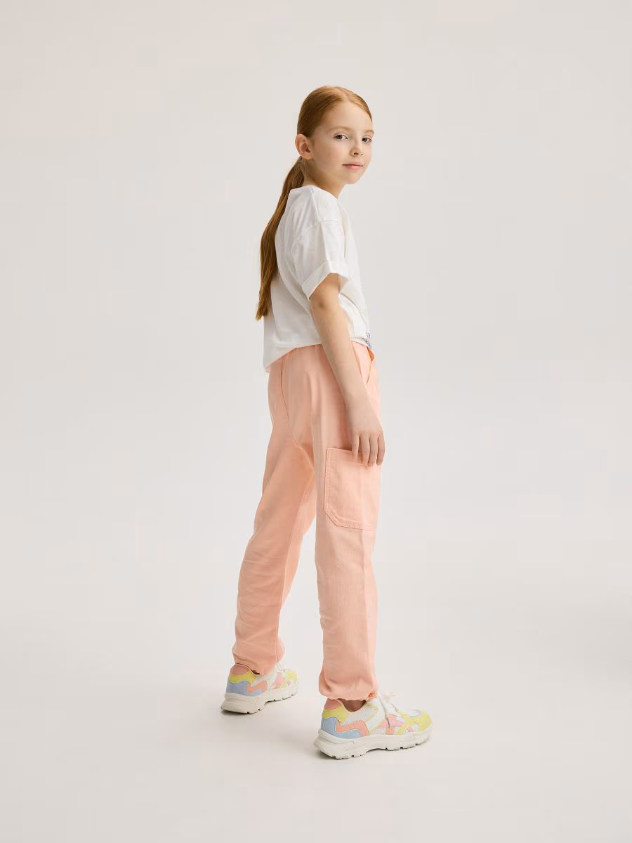 Trousers With Chain Detail