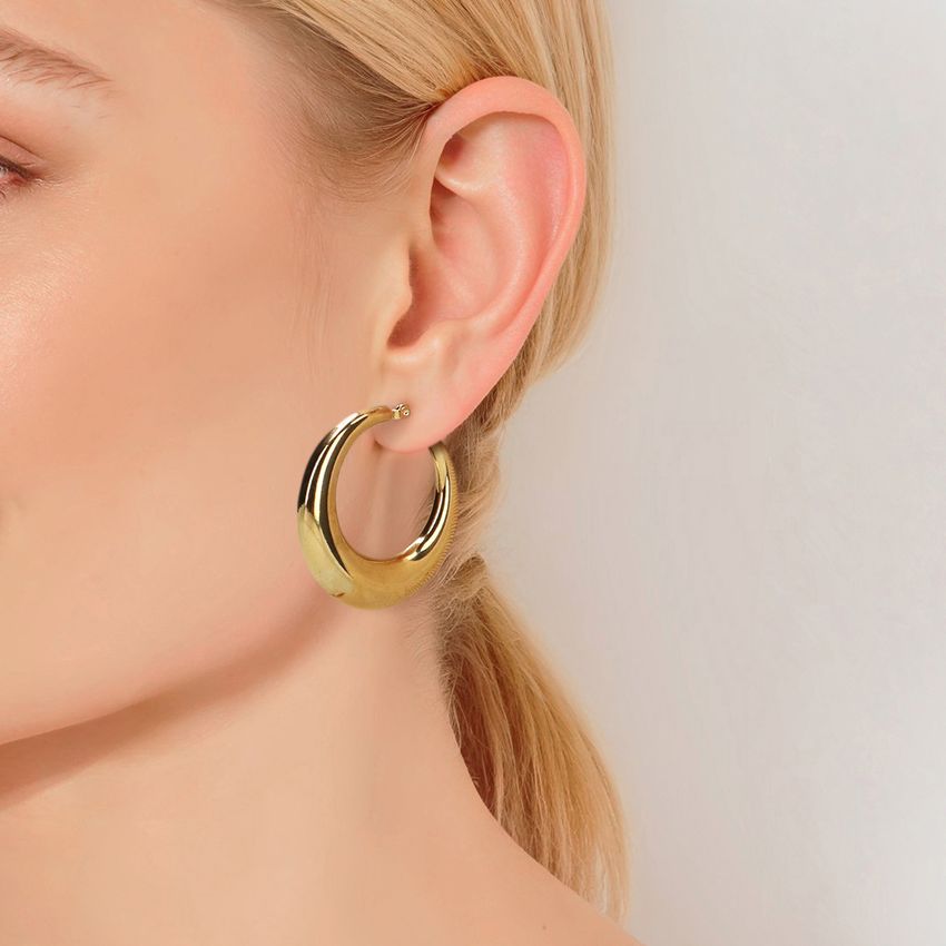 Manfield Grote ronden goudkleurige oorbellen