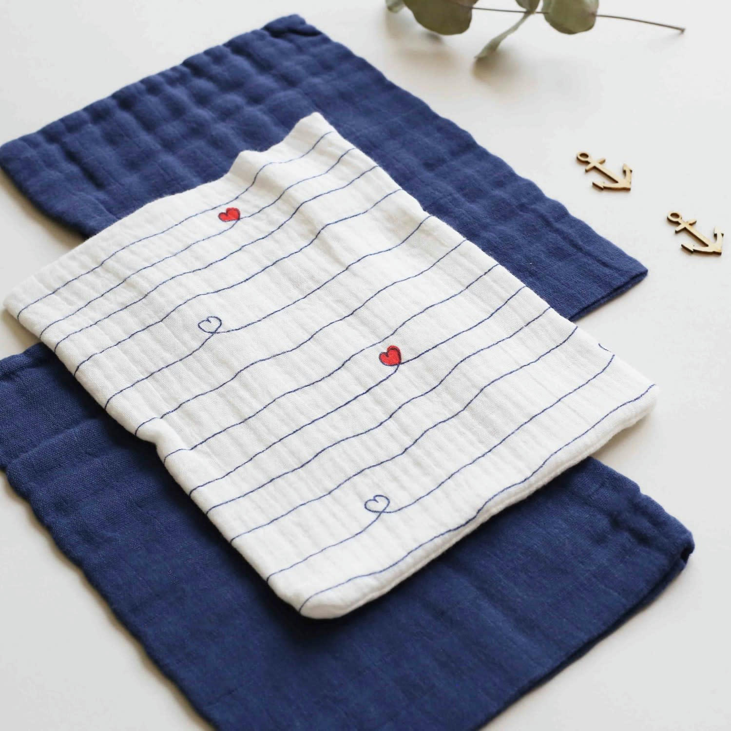 - Set de 3 gants de toilette