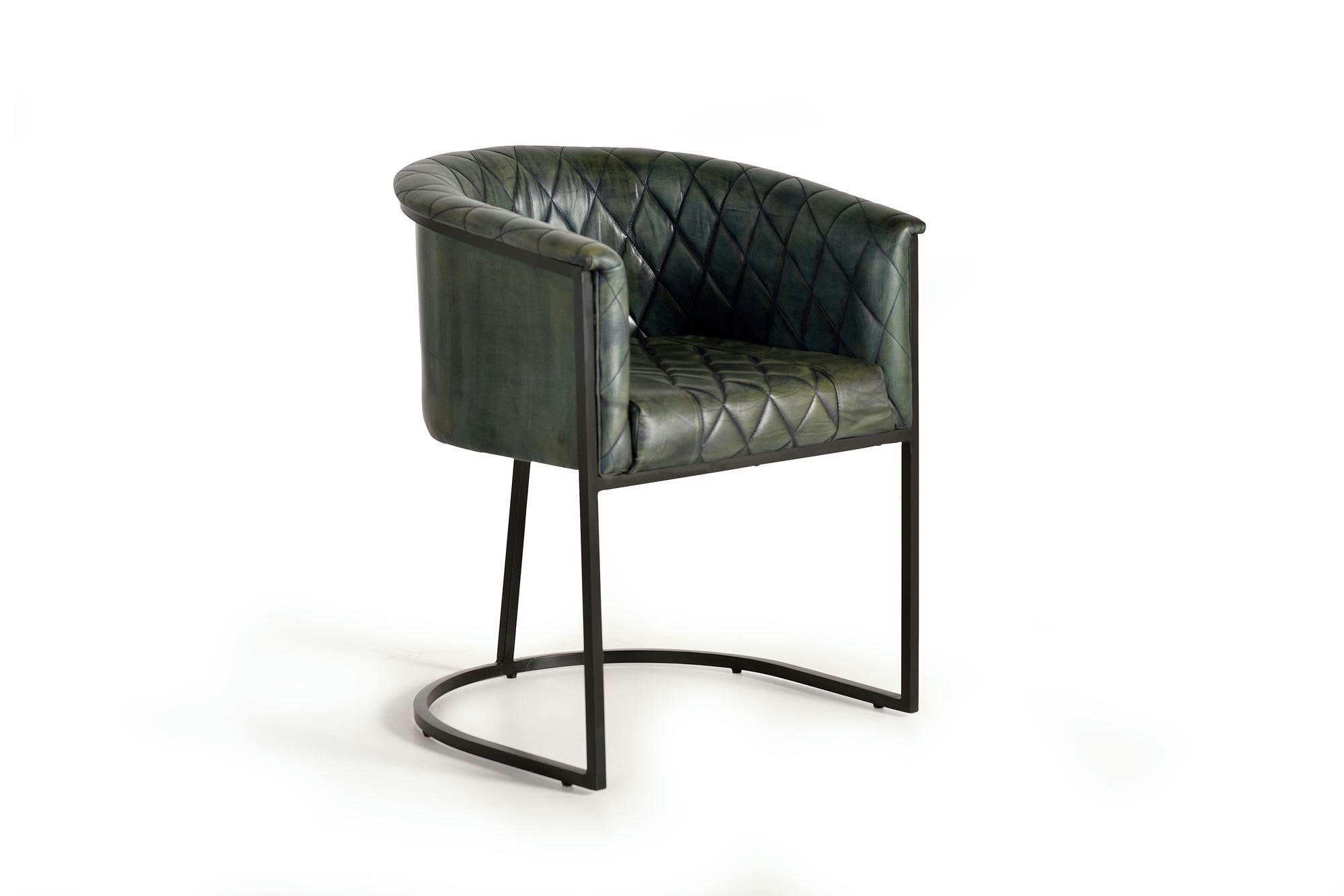 - Fauteuil en cuir vert materasée et métal