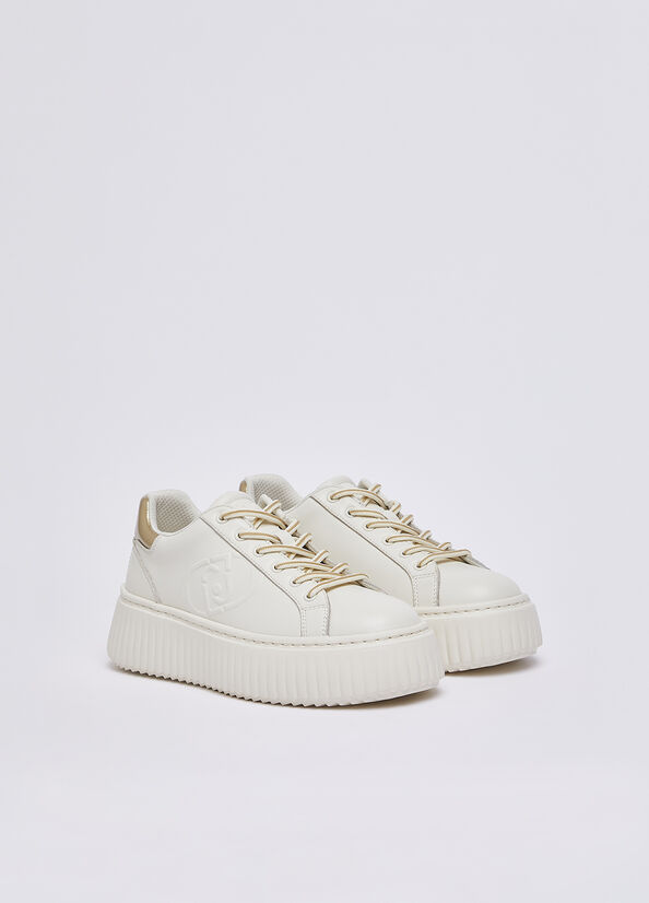 Sneakers in pelle con maxi logo