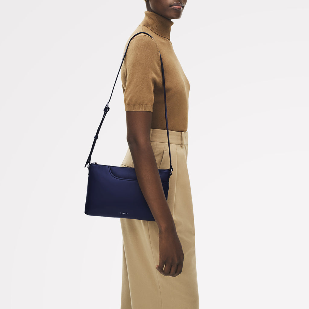 Pockets - Medium Ziptop East-West Cross Body Bag