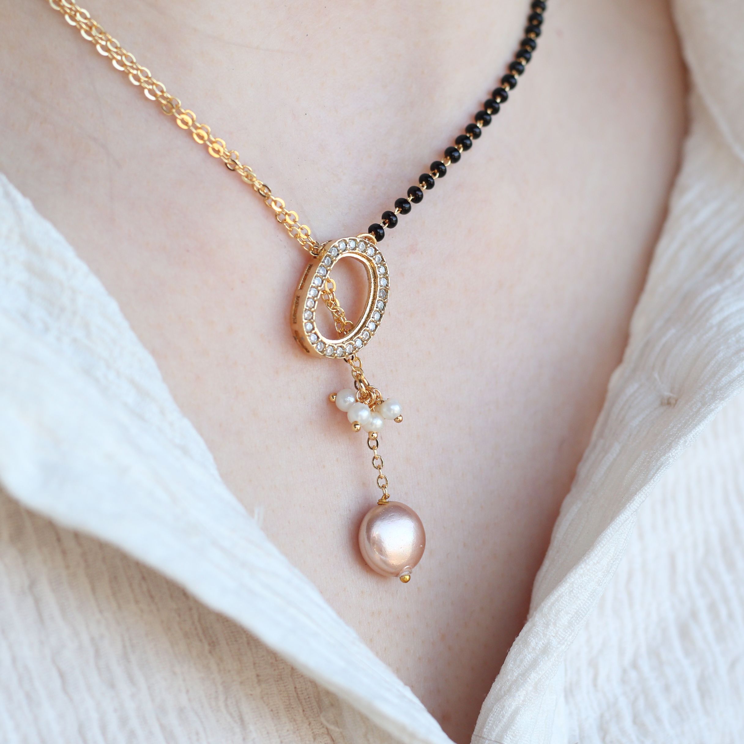 The Colourful Aura Half Black Bead Gold plated Oval Pearl Y shape Lariat Mangalsutra