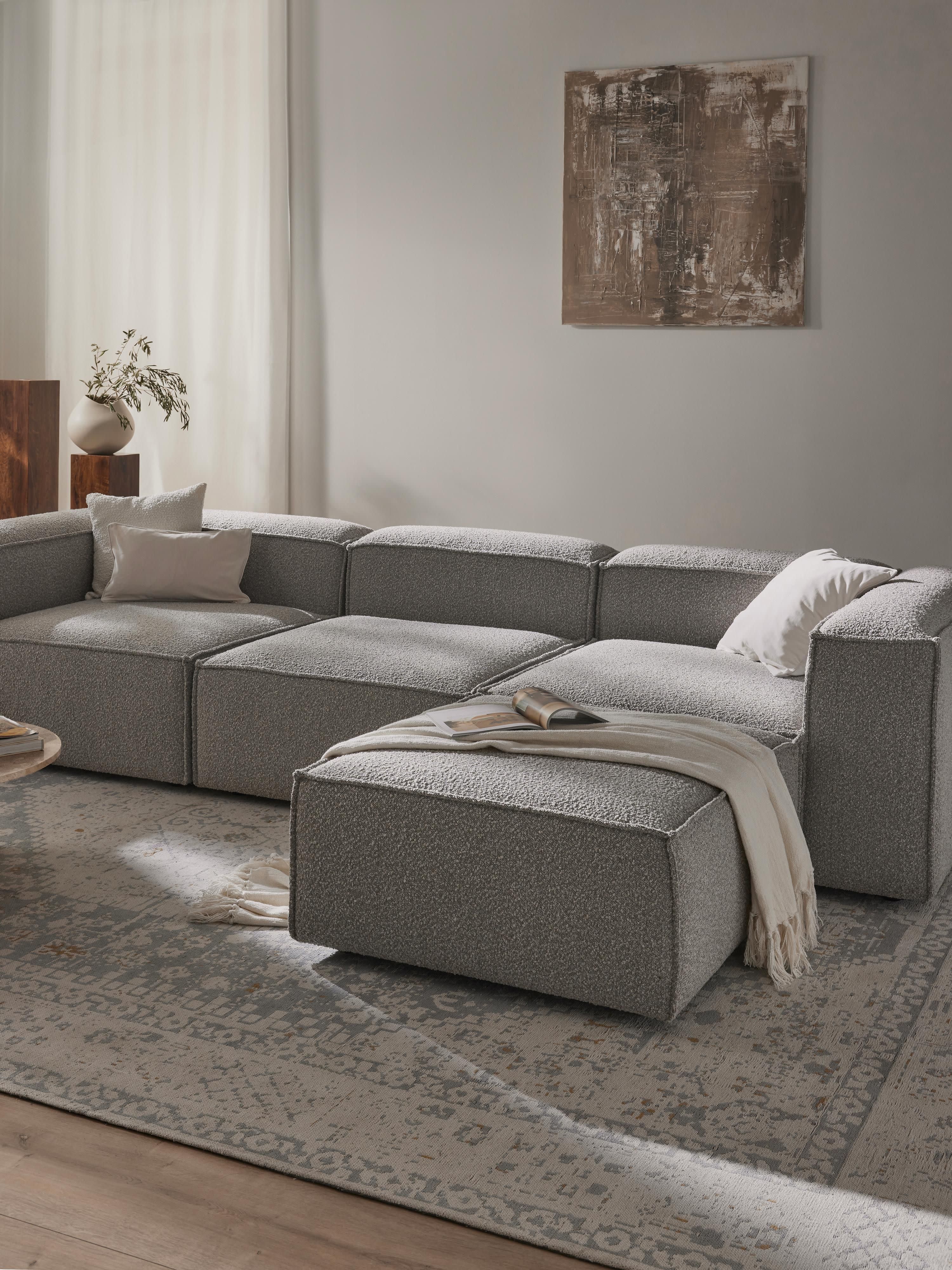 Modulares Sofa Lennon (4-Sitzer) aus Bouclé mit Hocker (links/rechts)