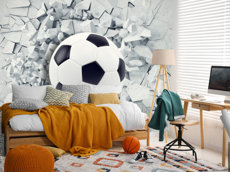 Fototapeta Piłka nożna w ścianie 100x70cm