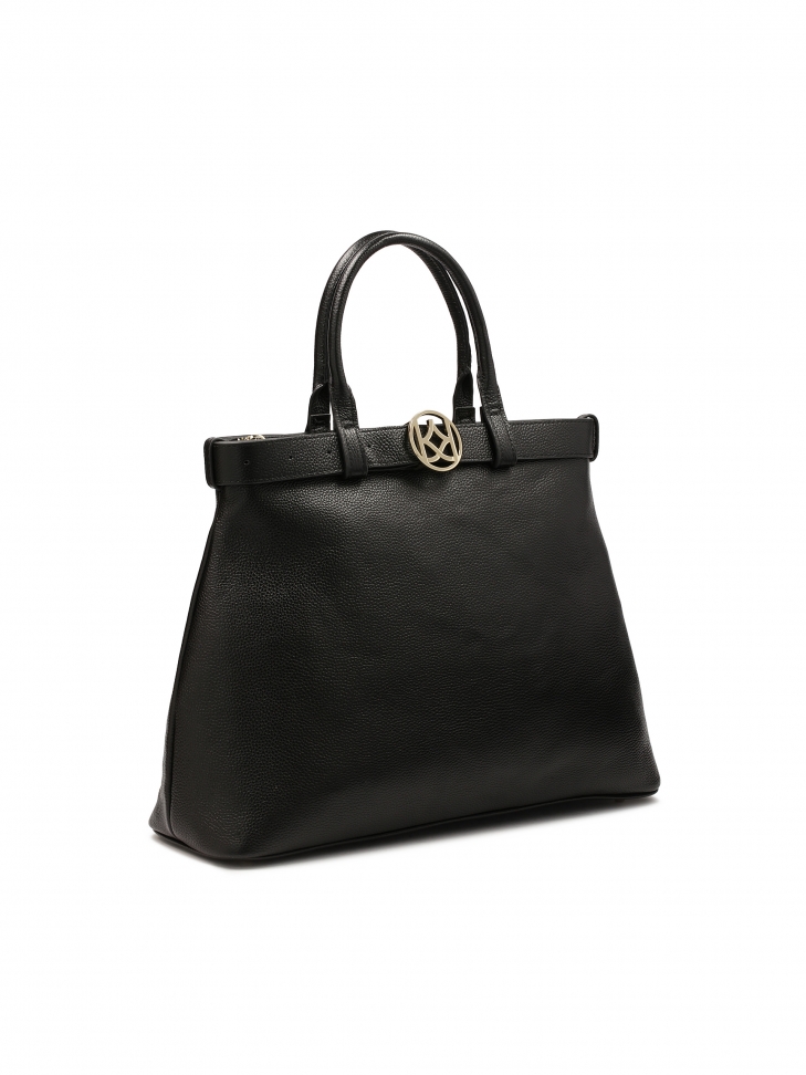 Trapeze bag decorated with a strap