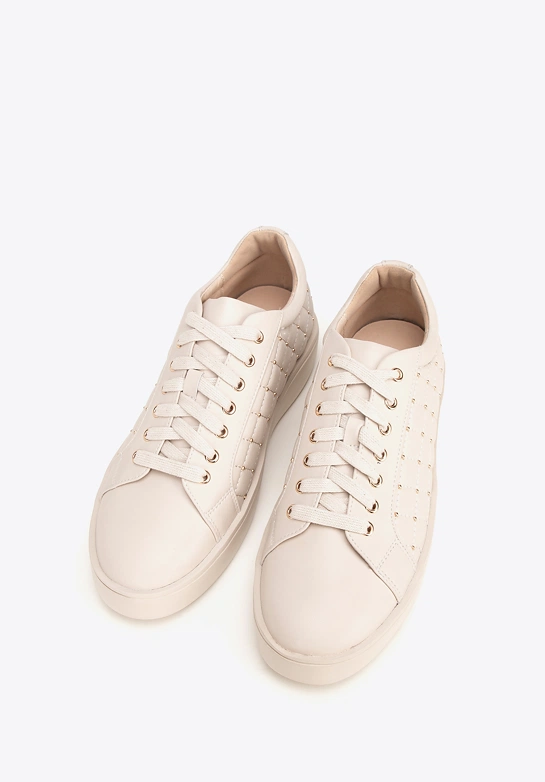 Damskie sneakersy skórzane z pikowaną cholewką kremowe