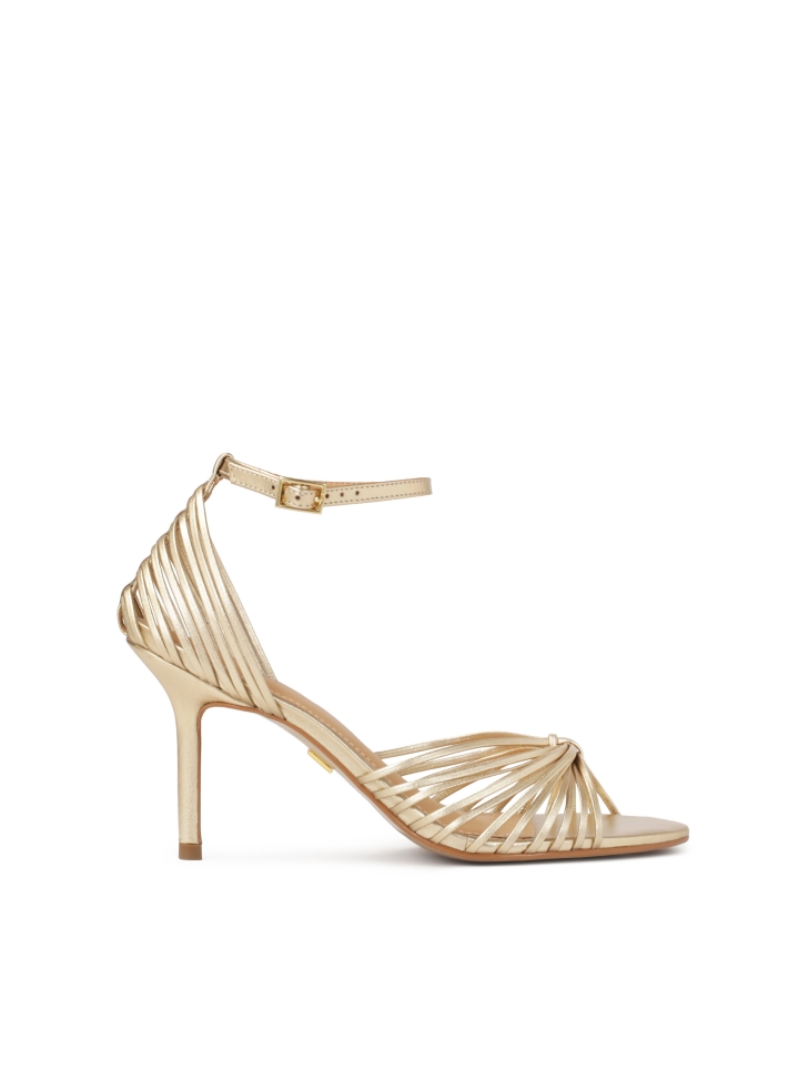 Gold sandals with thin straps