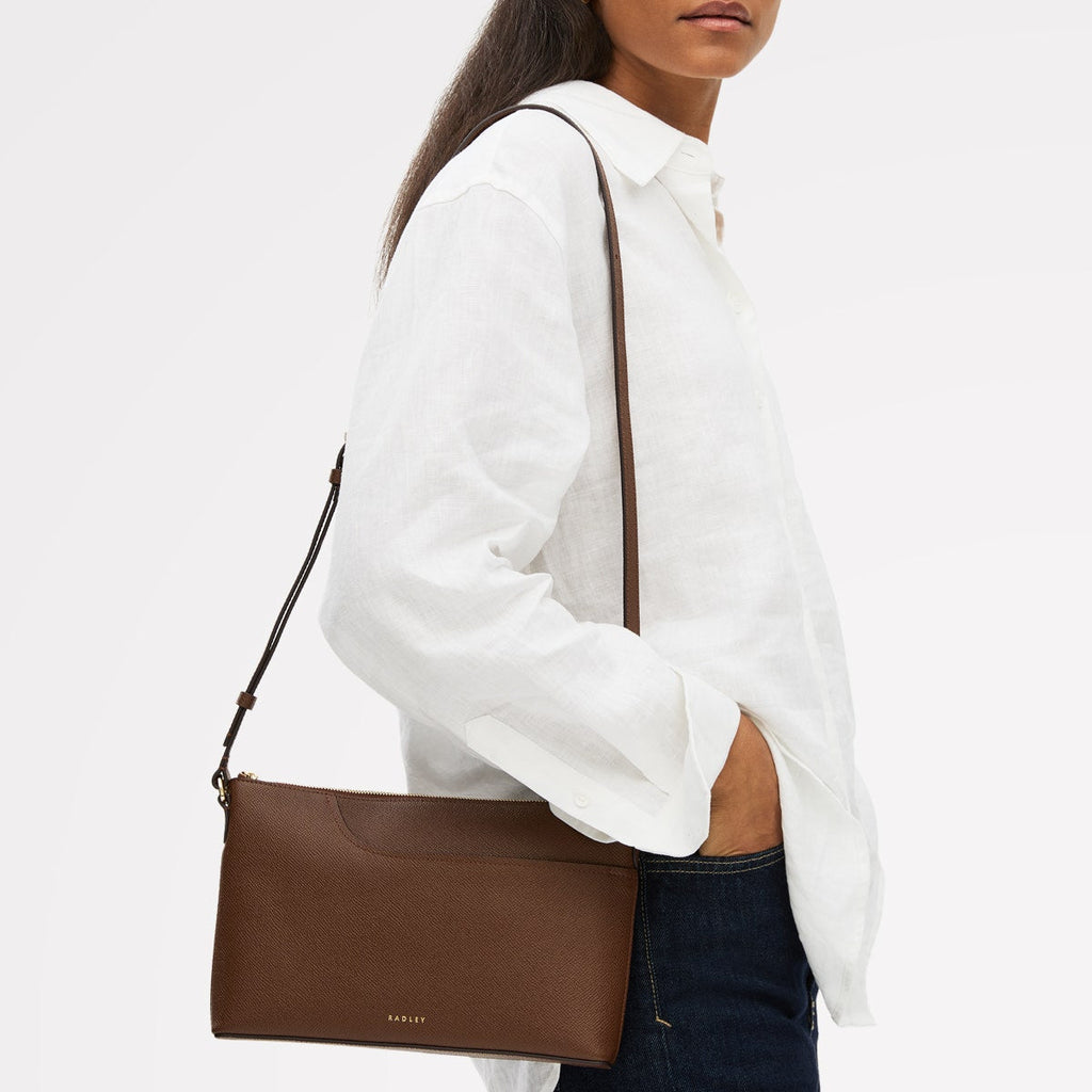 Pockets - Medium Ziptop East-West Cross Body Bag