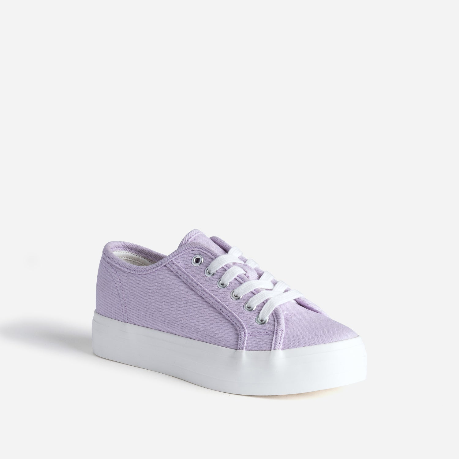Tennis toile violette à semelle blanche