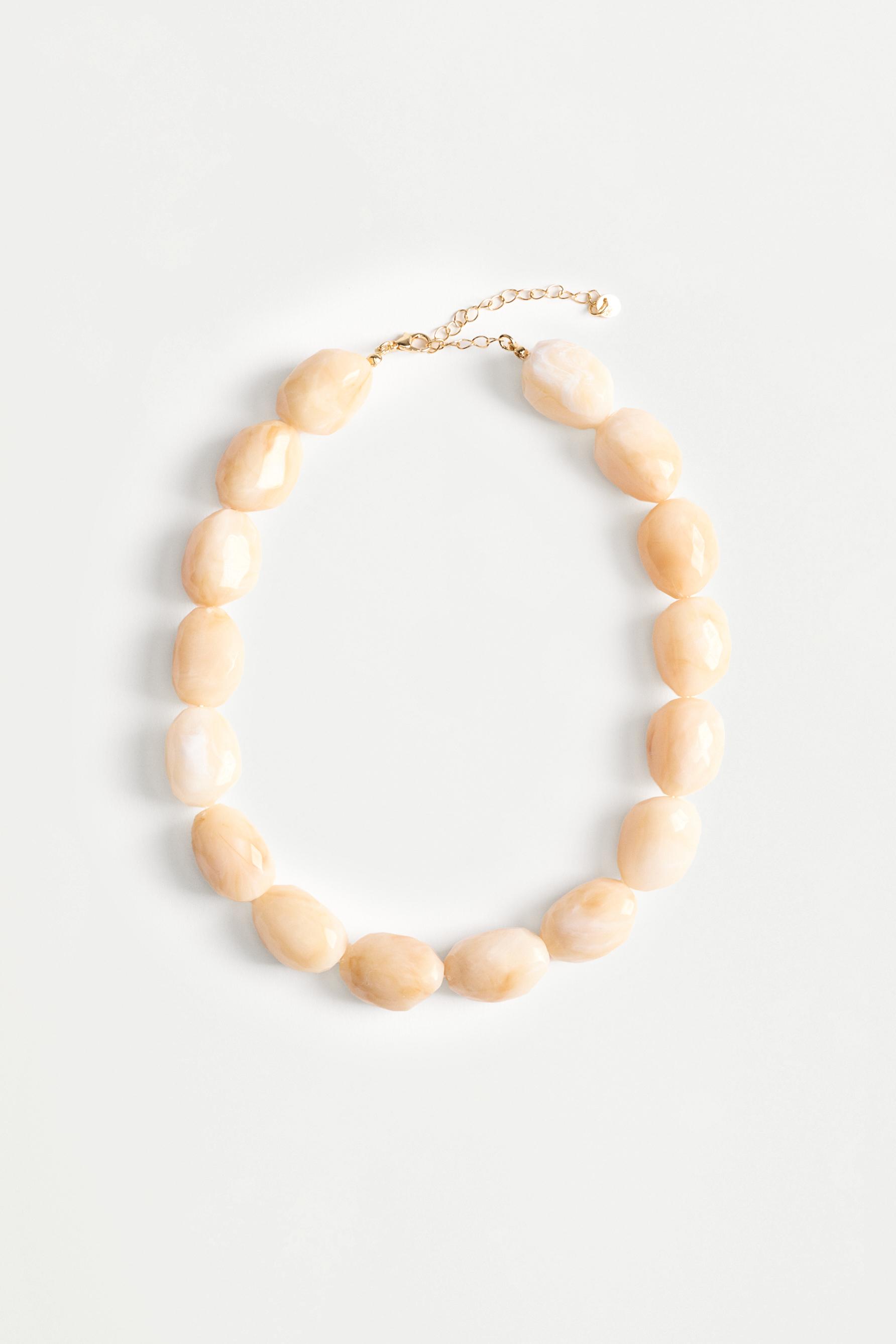 Collar de bolas beige