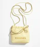 CHANEL 22 MINI HANDBAG Shiny Calfskin & Gold-Tone Metal Light Yellow