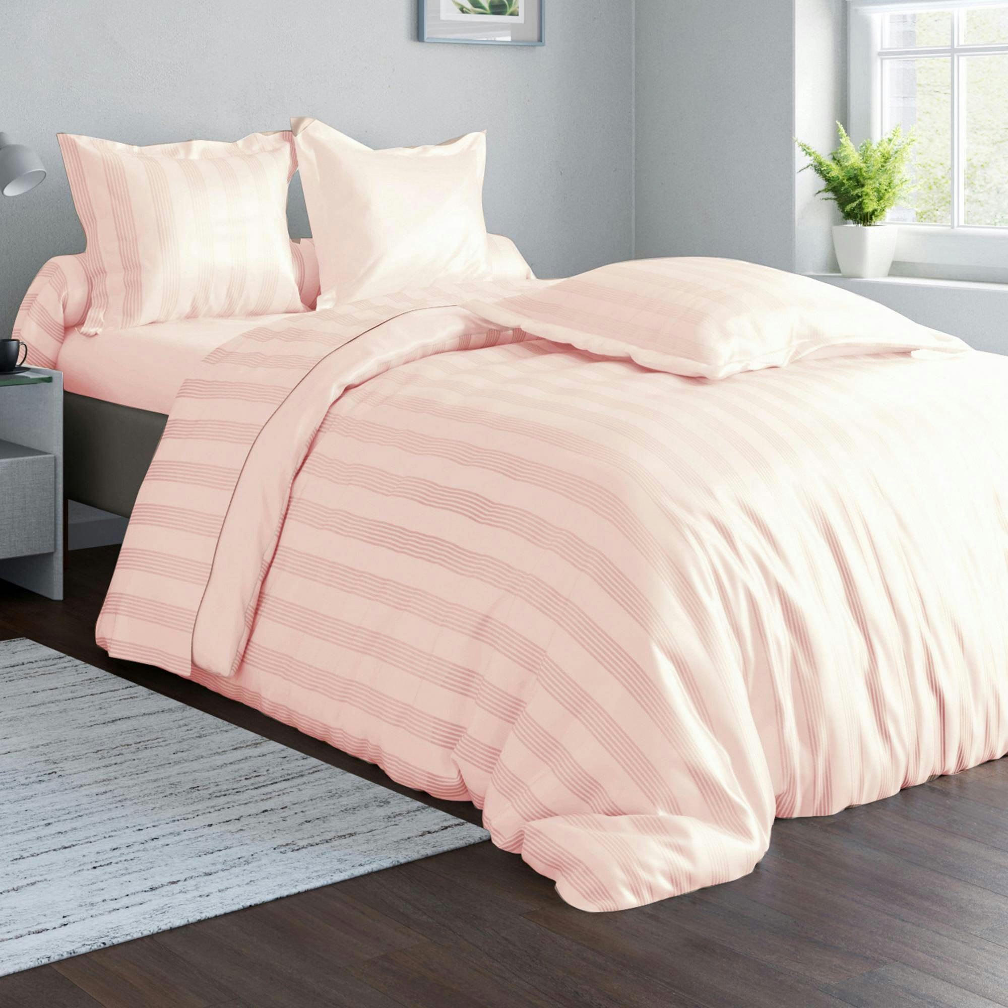 SATIN RAYE/UNI - Taie volant 50x70 rose nude en coton