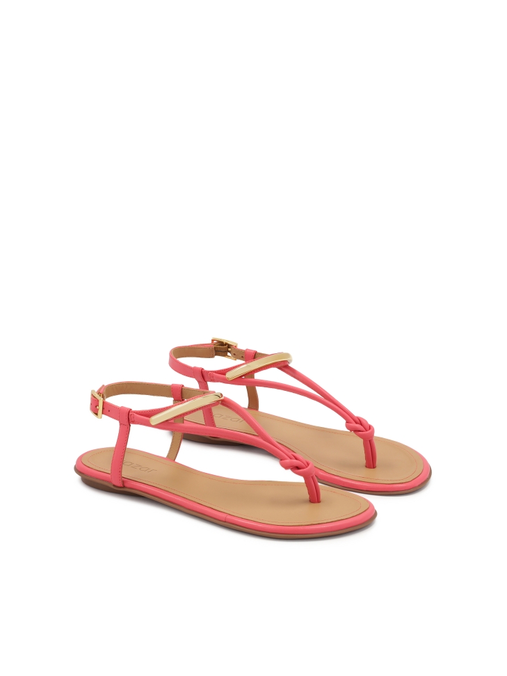 Pink flat sandals with metal embellishment
