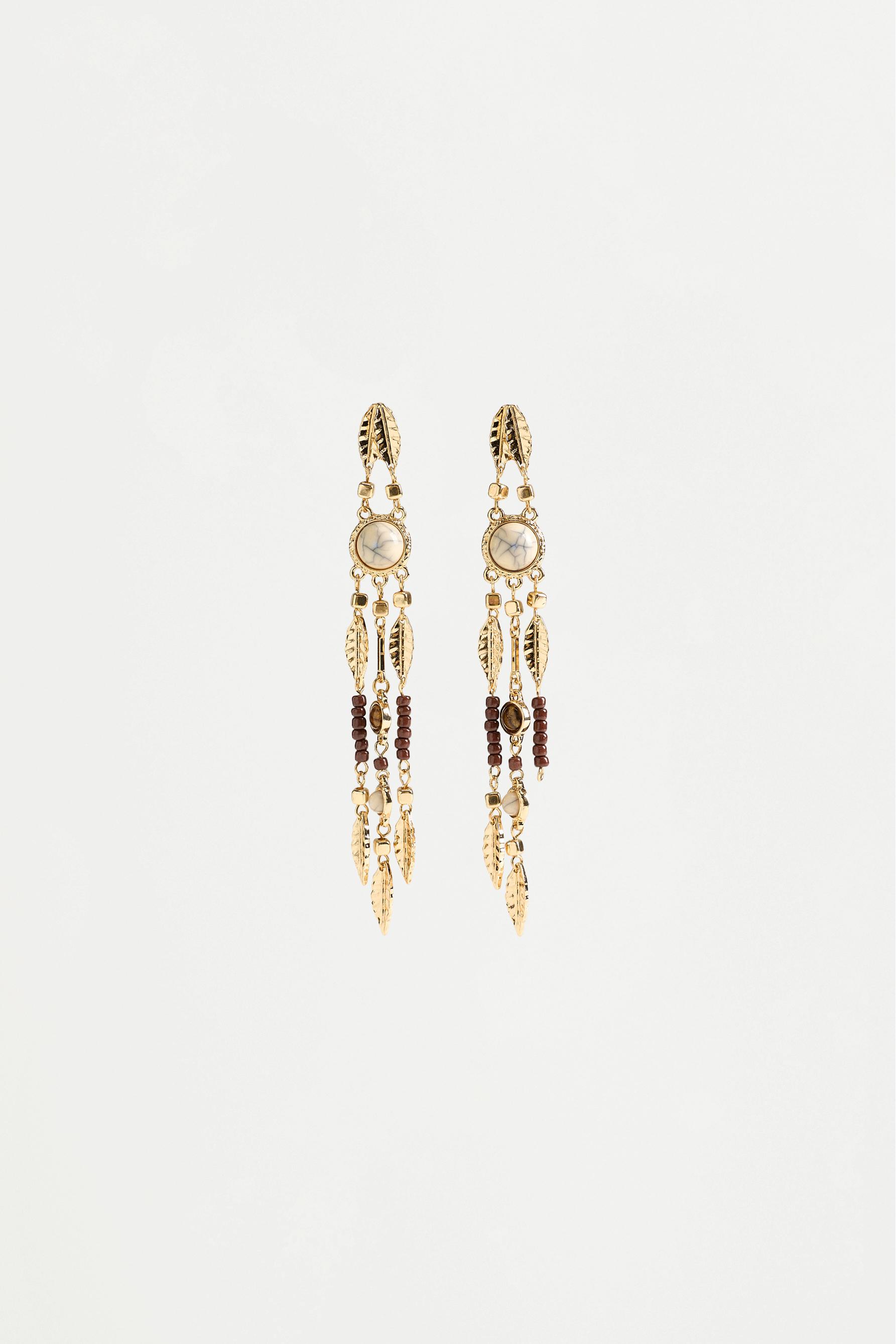 Pendientes largos con piedras y hojas