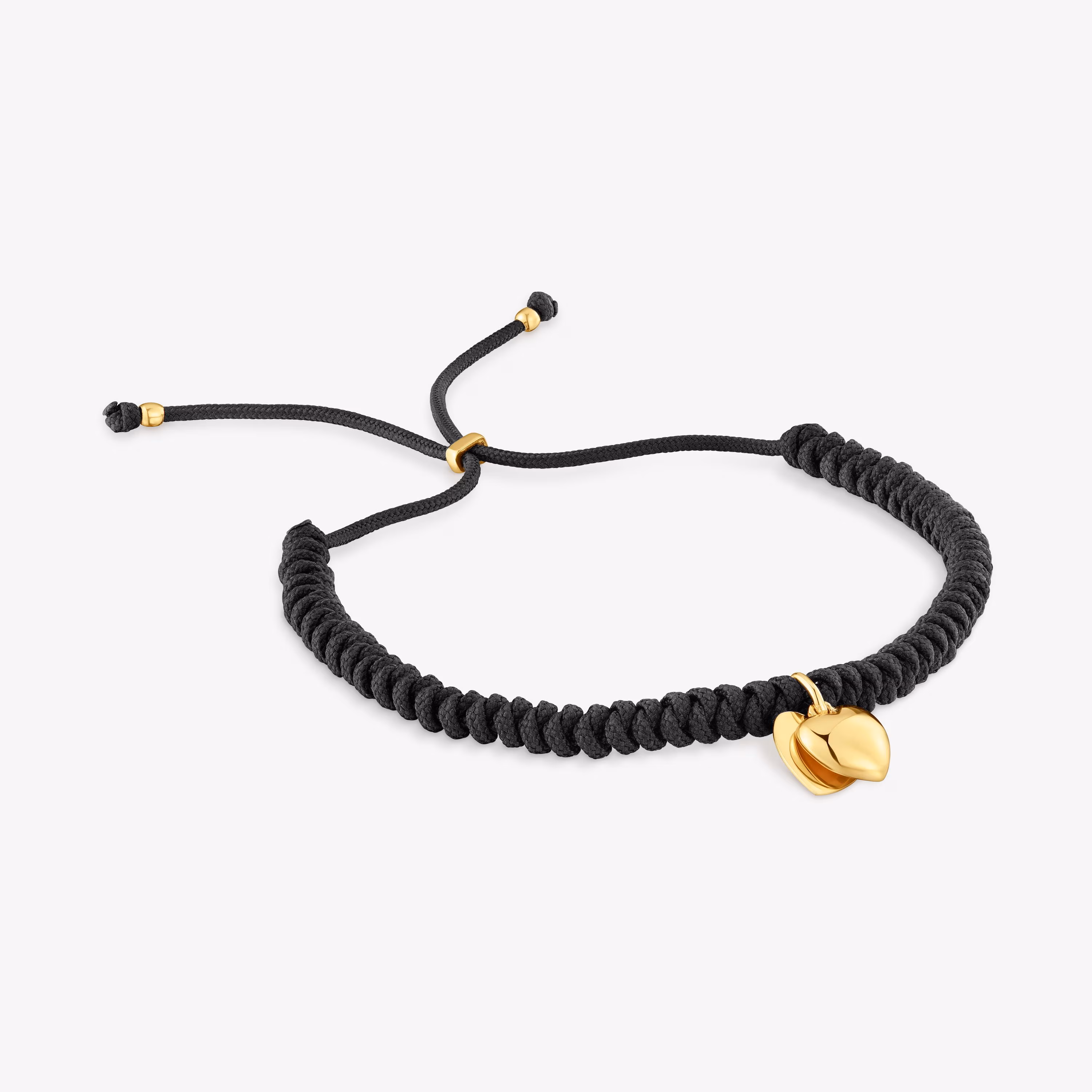 Pulsera de oro 14 kt doble corazón y nylon negro TOUS Flechazo