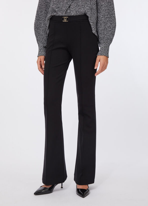 Pantaloni flare con cintura