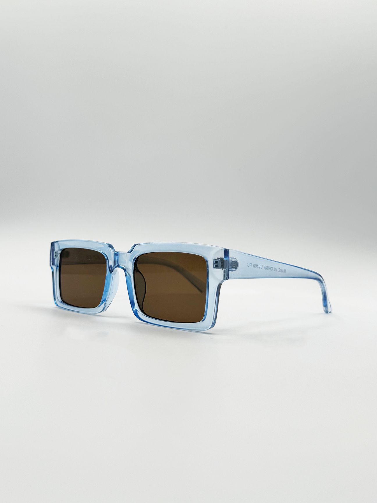 SVNX Square Frame Sunglasses in Translucent Blue with Brown Lenses