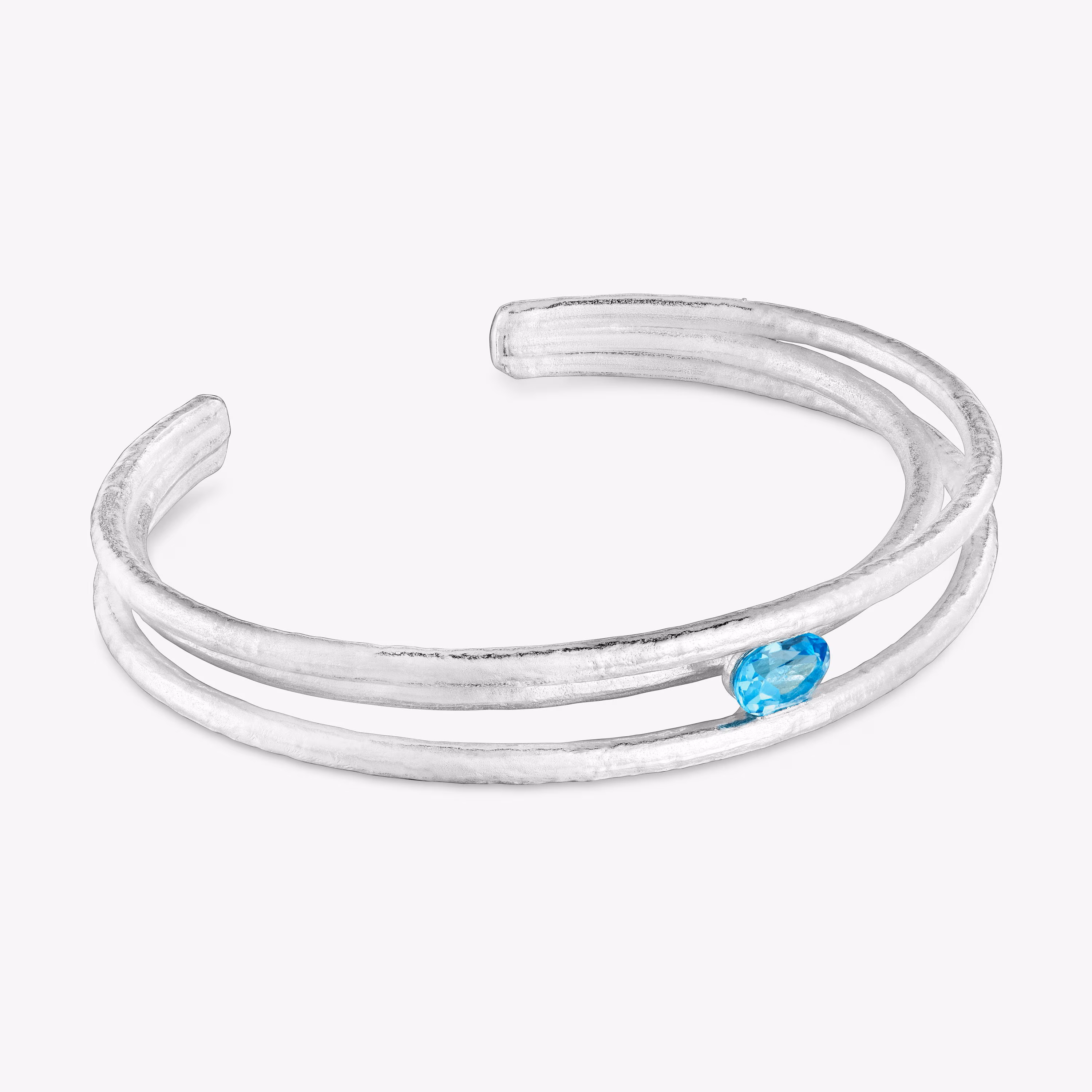 Pulsera esclava de plata y topacio Duna