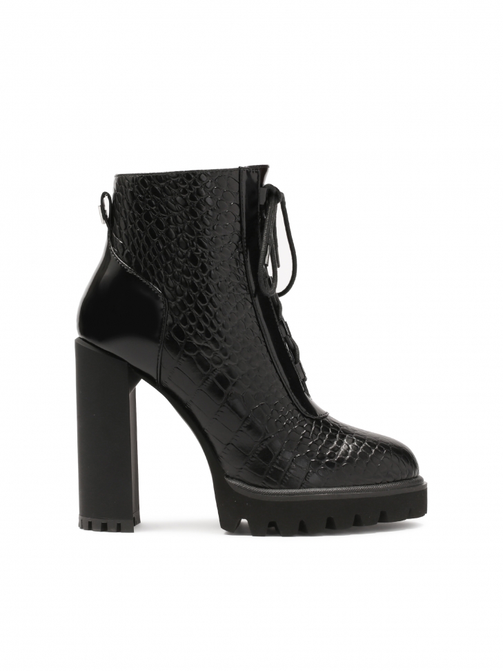 Embossed leather boots with heel and thick sole