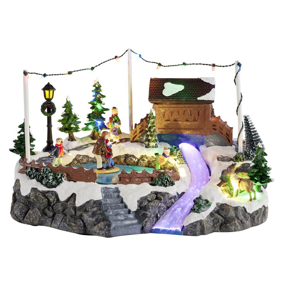 Village de No&euml;l animé LED et sa patinoire 32,5x22xH20cm