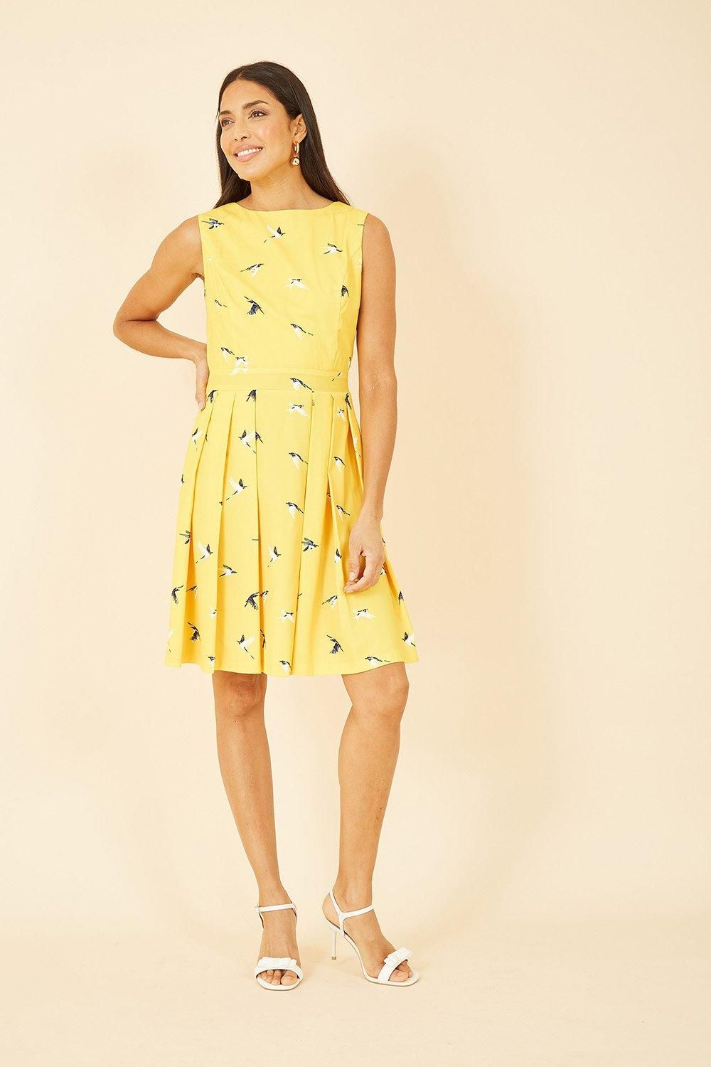 Mela Yellow Swallow Print Skater Dress