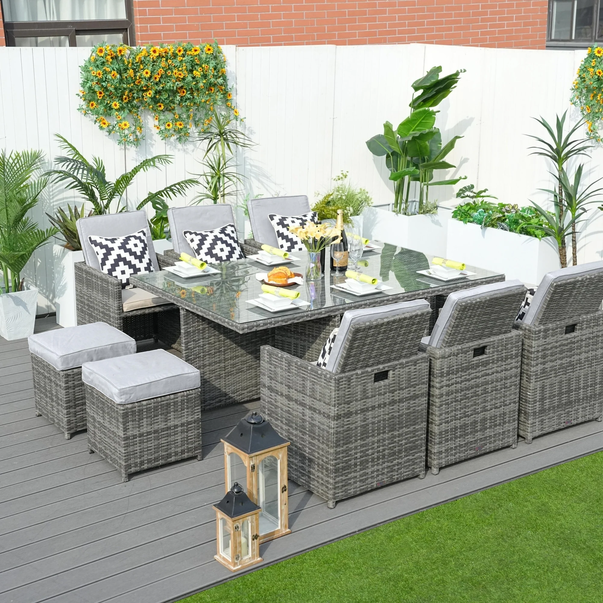 11-Piece Aluminum Wicker Outdoor Dining Set with Cushions and Tempered Glass Tabletop