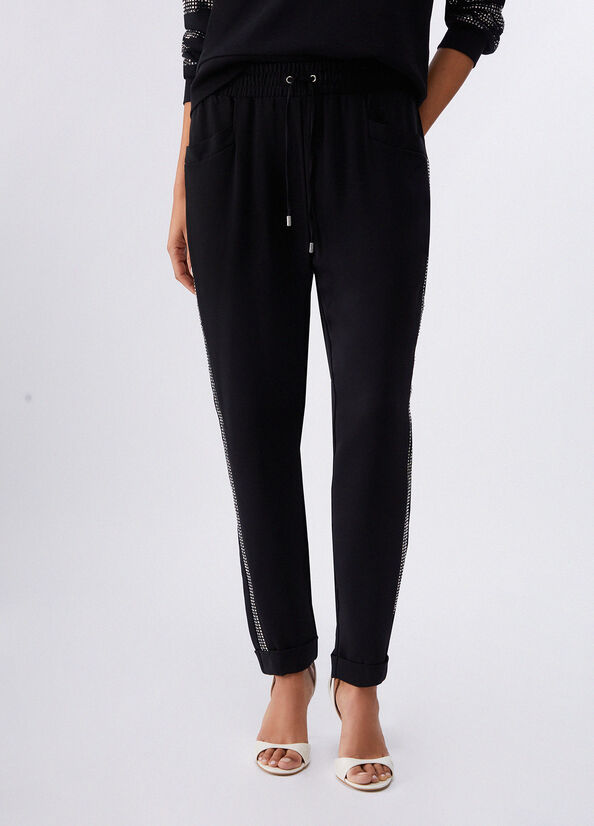 Pantaloni con strass
