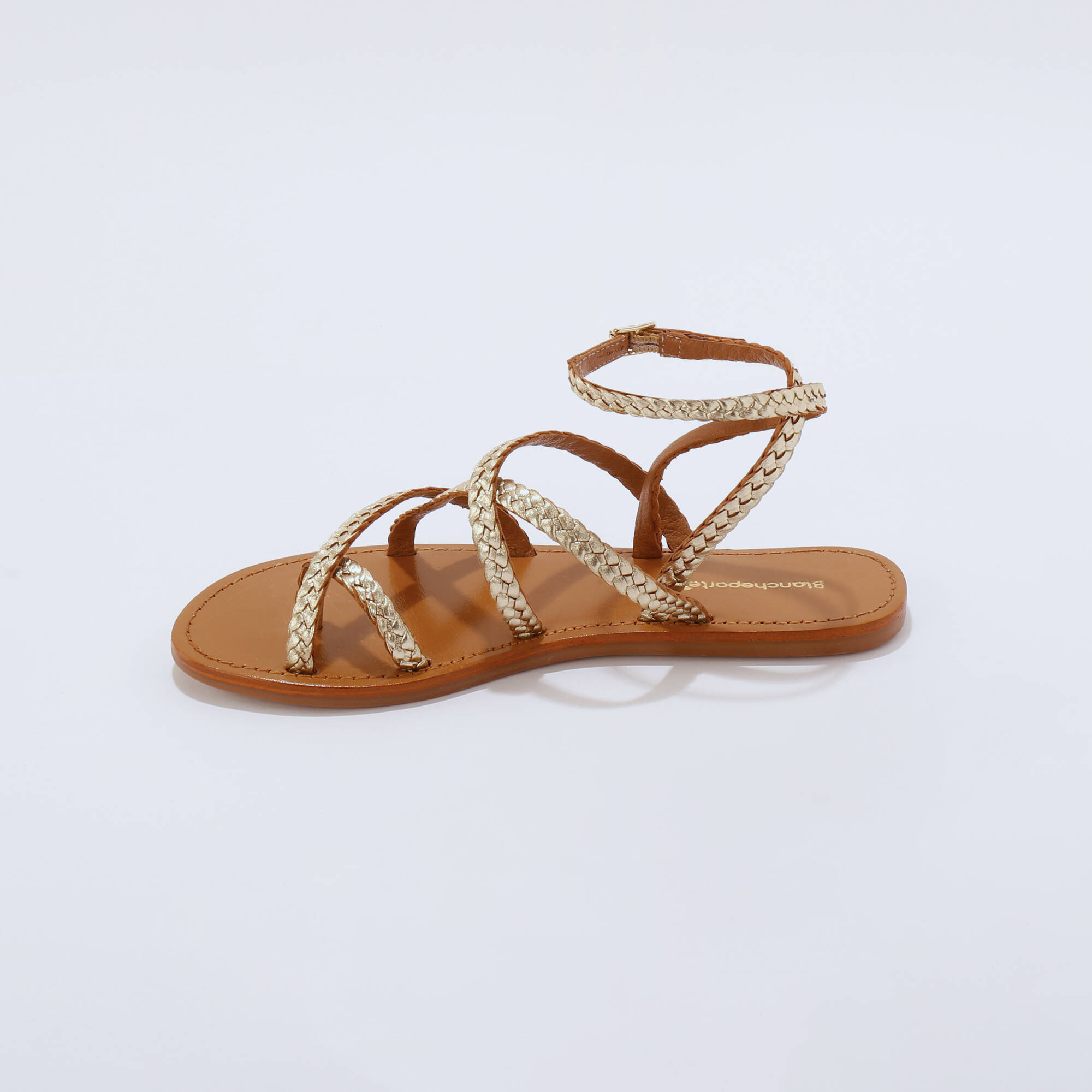 Sandales plates tressées cuir