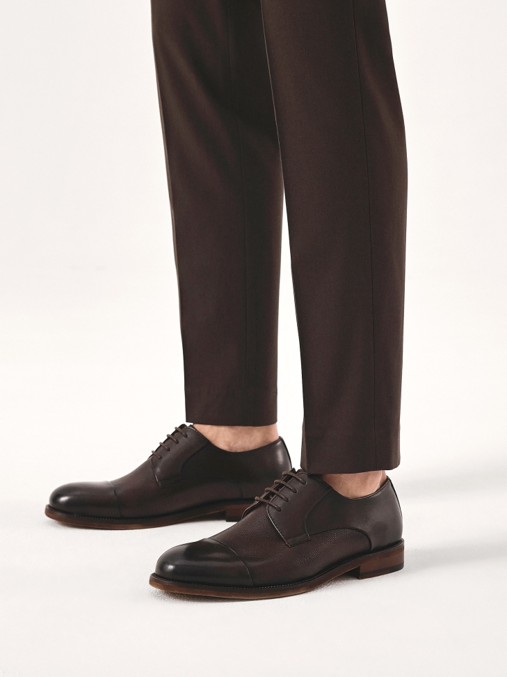 Brown men's shoes with overlapping toe cap