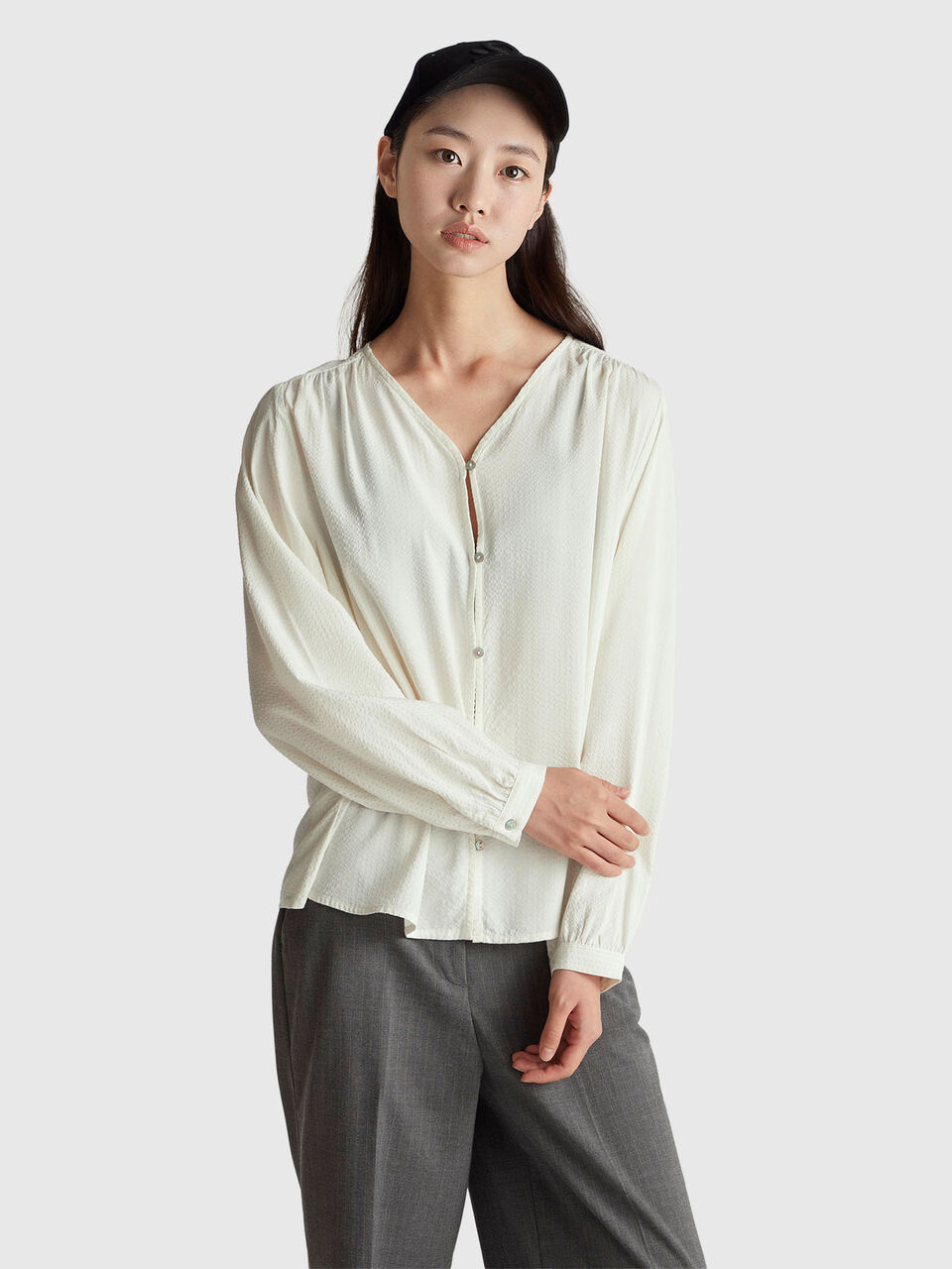 Striped shirt with V-neck