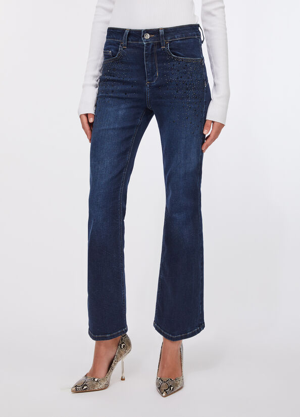 Jeans flare cropped con strass