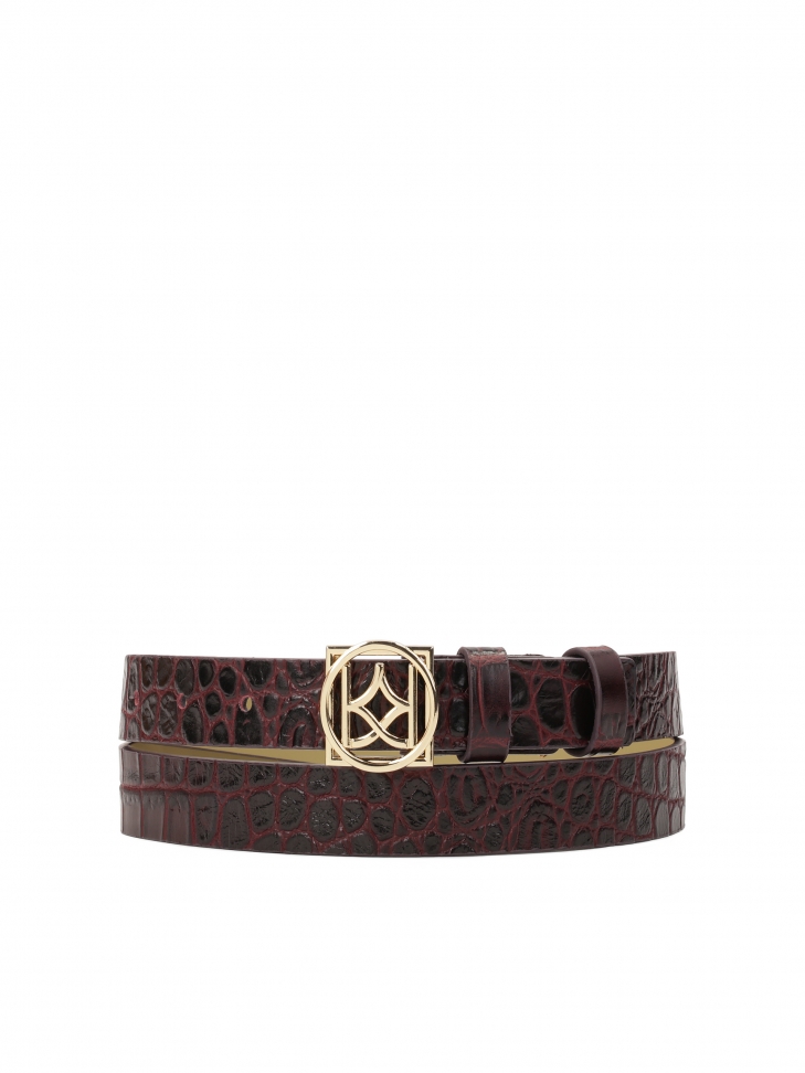 Maroon embossed pattern belt with monogrammed KAZAR buckle